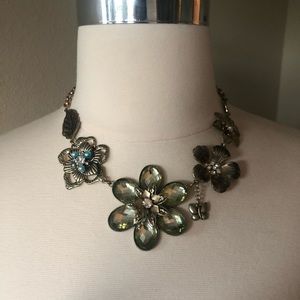 Chocker style burnished metal necklace.